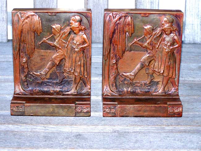 A Fine and Rare pair of Antique Bronzed Art Nouveau Bookends by the Pompeian Bronze Co. of New York circa 1915.